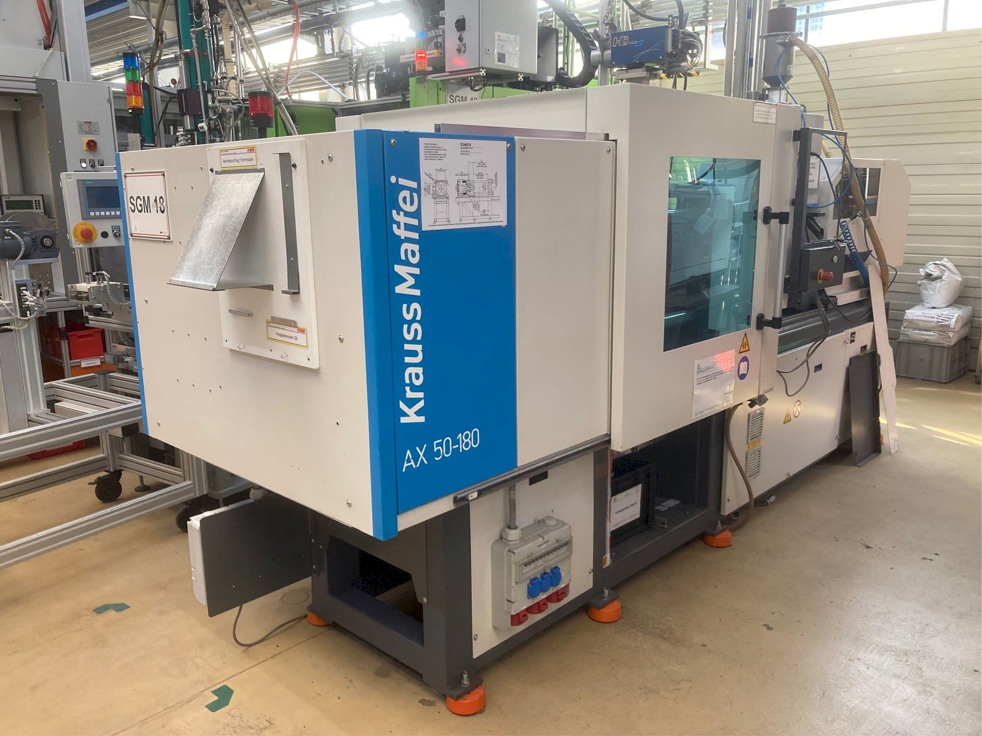 A Krauss Maffei AX 50-180  gép oldalnézete