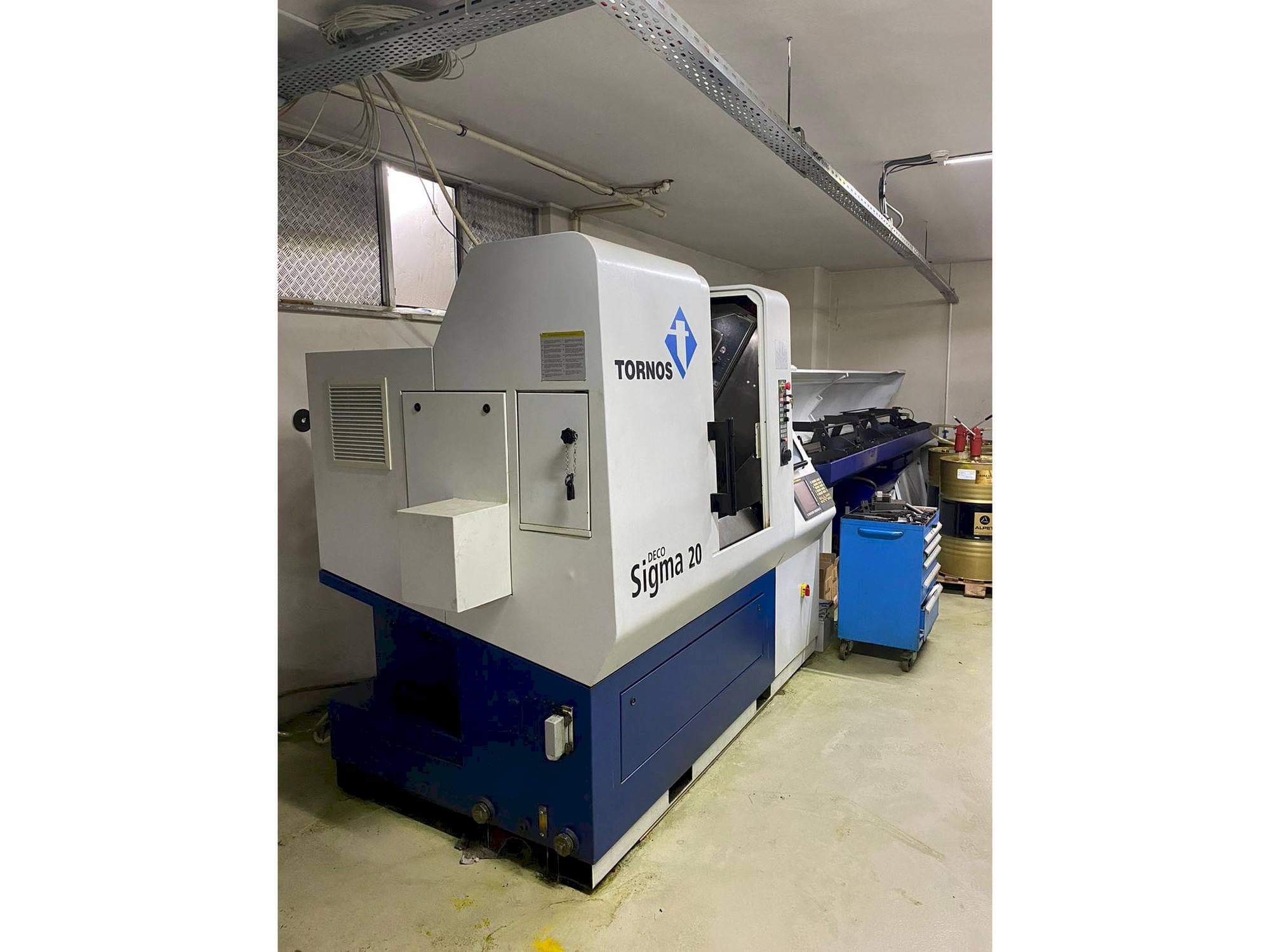 A Tornos Delta Sigma 20  gép oldalnézete