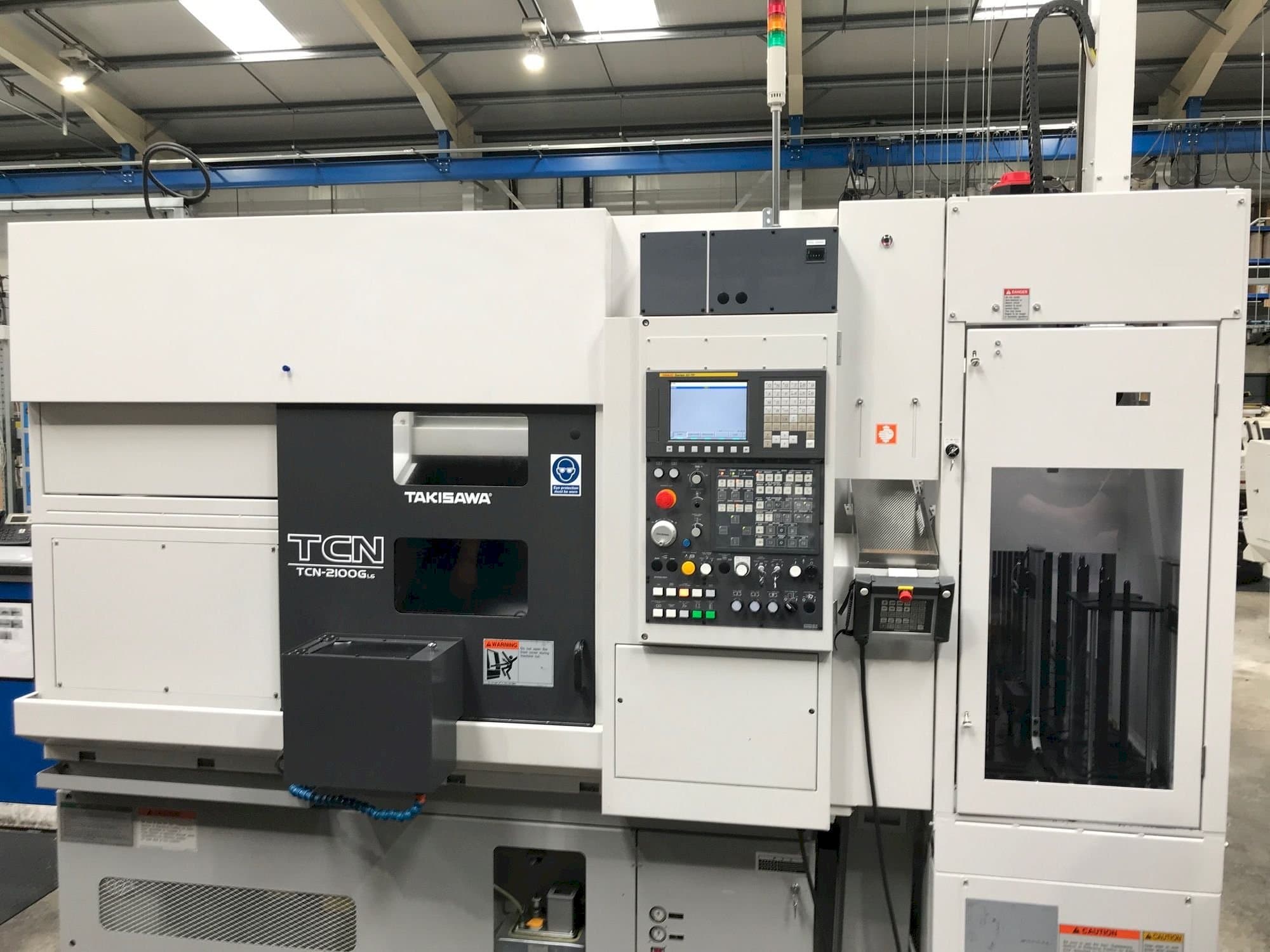 A Takisawa TCN-2100G L6  gép elölnézete