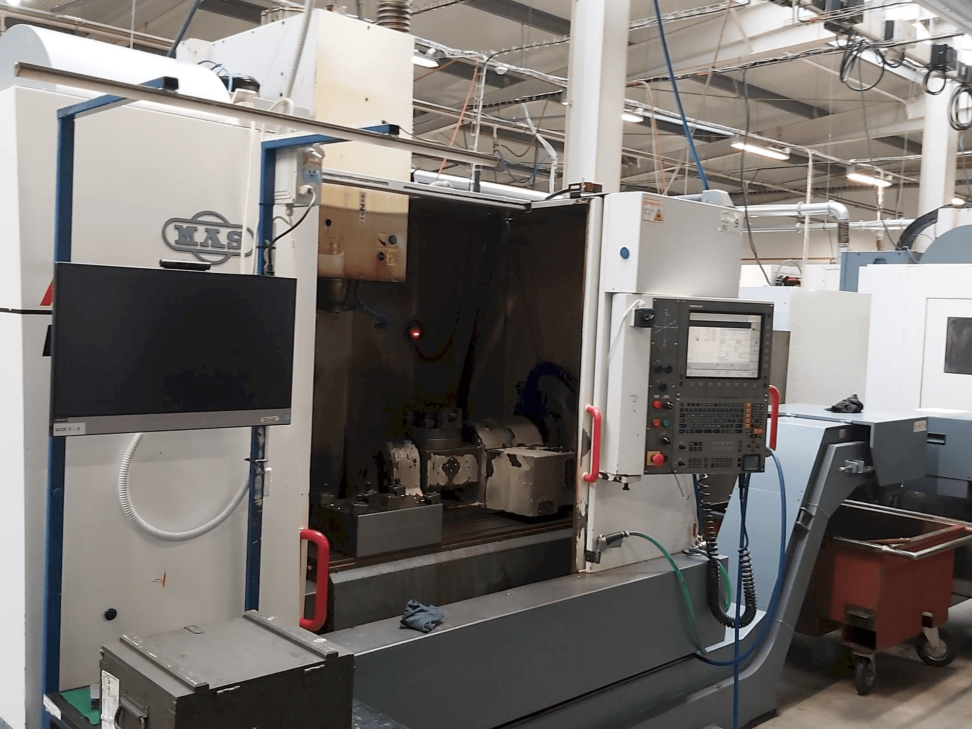 A KOVOSVIT MAS MCV 1016 Quick gép oldalnézete