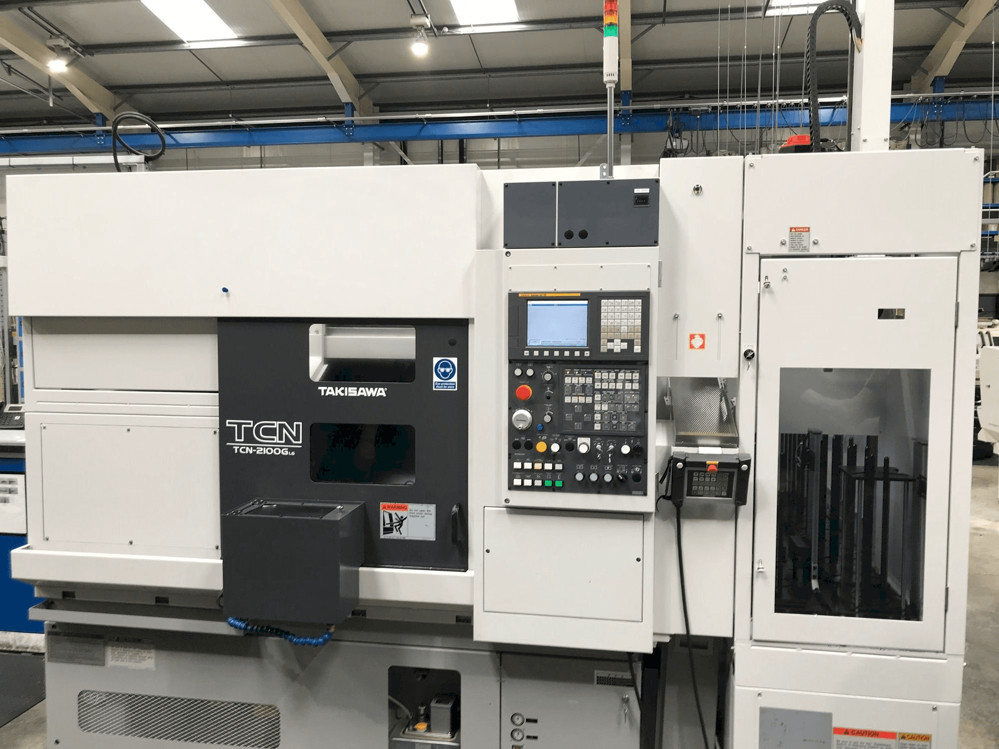 A Takisawa TCN-2100G L6 gép elölnézete